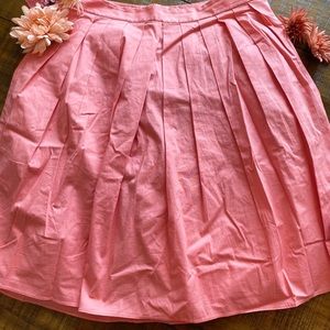 TABARI Vibrant Coral pleated skirt